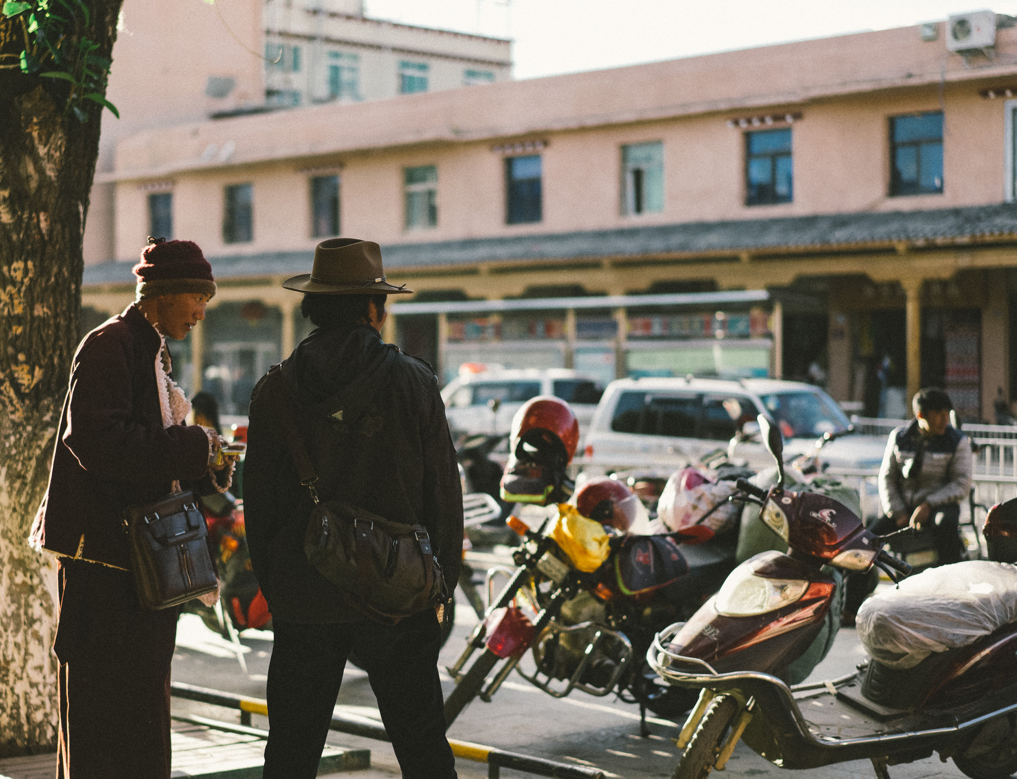 the monk and the cowboy in Litang, Sichuan