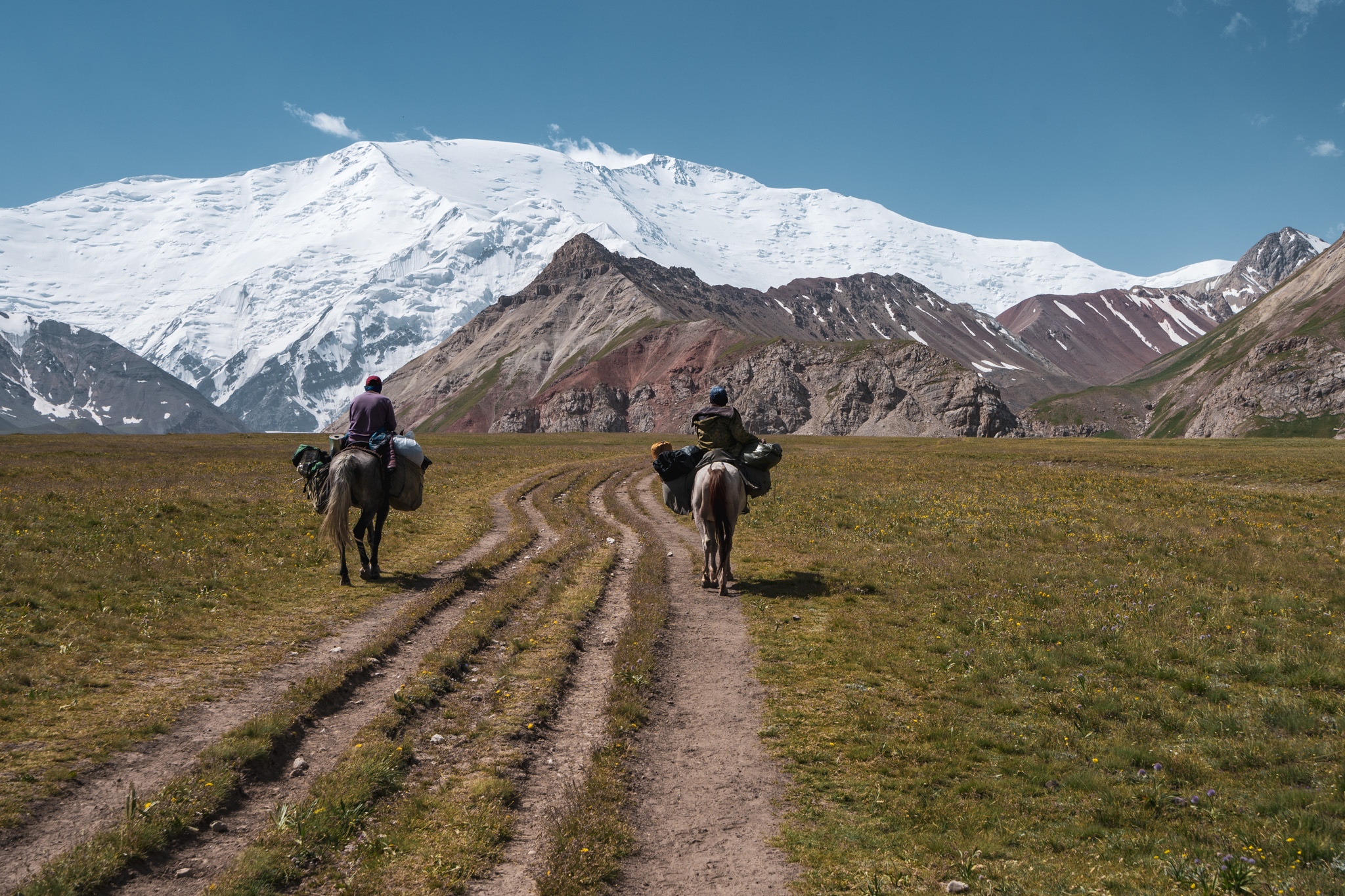 Hiking from Lenin Peak Base Camp towards Camp 1