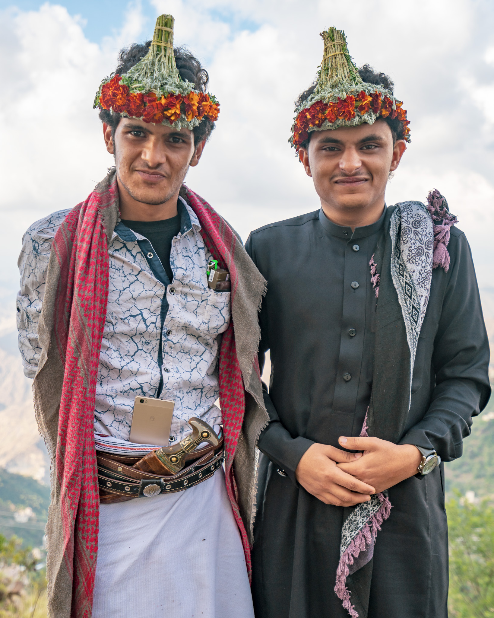 Local boys wearing traditional flower hats in Fayfa